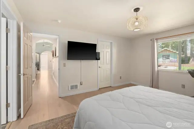 Notice all the light and the lovely flooring! That door to the right leads to the walk-in closet!