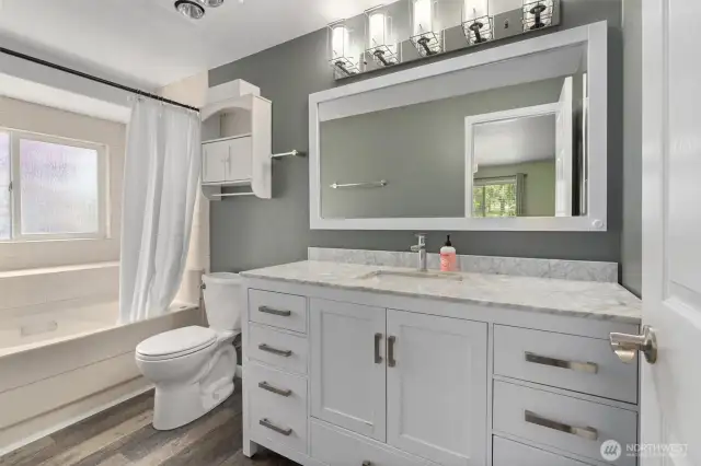 Relax and unwind in the jetted tub! Isn't this a pretty bathroom?