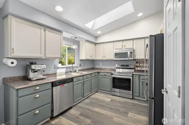 You will love all the light in this kitchen!!