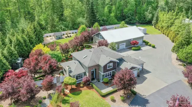 [ONCE IN A LIFETIME OPPORTUNITY] The perfect home comes up and has something for everyone, a true Multi-Generational [UTOPIA], this is the one! This [EPITOME OF EXCELLENCE] is located on 2.42 acres of phenomenal grounds, featuring 3 bedroom, 3 bathroom home, chef inspired kitchen, formal and casual living, primary suite w/ fireplace, covered deck, gardens, gazebos and so much more. HUGE SHOP 40 x 64 plus a 20x18 welding shop, there are living quarters, entertaining quarters (full kitchen, kitchenette, laundry, bathrooms) and even office space. Equipped with car lift and parking for at least 6+ vehicles. ALL IN ONE DREAM ESTATE! Hurry on this one, it really is an amazing home and SHOP. Fruit trees, gardens and so much more.
