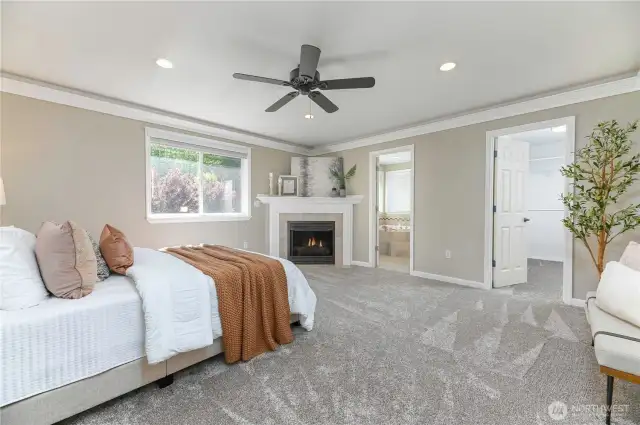 The primary retreat suite is a luxurious sanctuary, offering a serene atmosphere with ample space, a spa-like en-suite bath, and a walk-in closet, providing the perfect escape at the end of the day.