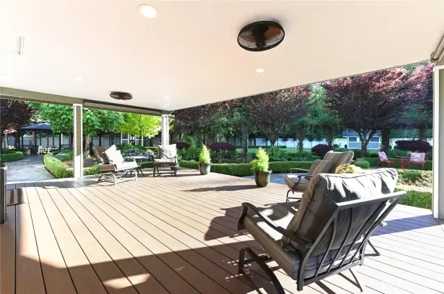 A large covered deck off the family room offers endless hours of enjoyment, perfect for outdoor dining, relaxing, or entertaining, all while enjoying the beauty of your surroundings.