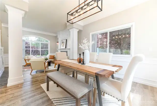 The elegant dining room offers the perfect setting for both formal dinners and casual gatherings, with ample space and a warm, inviting ambiance.