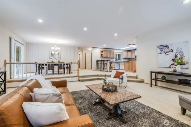 Open floor plan looks into dining room and kitchen area.