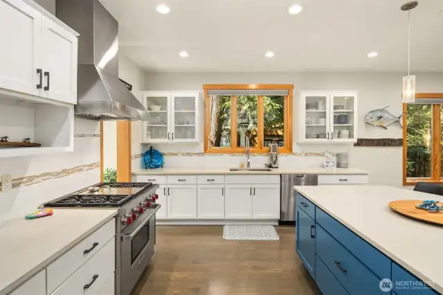 Oversized Quartz seating Island, and subway tile backsplash.