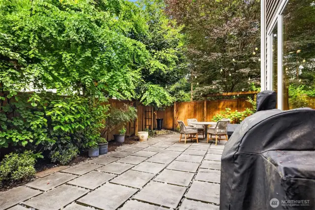 Outdoor Zen tranquility: stylish pavers, and one of two water features.