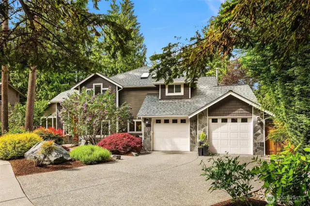 A tranquil, quite neighborhood locale ~ a stunning, remodeled and upgraded home on a wooded, tastefully landscaped lot.