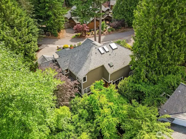 Oversized three car garage with shop space. Air conditioning/efficient heat pump, whole-house generator, and tankless hot water.