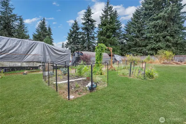 Tons of gardening space in this yard.