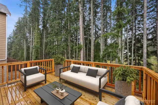 Enjoy main floor private deck and covered patio. Photo's are for representational purposes only. Colors and finishes may differ.