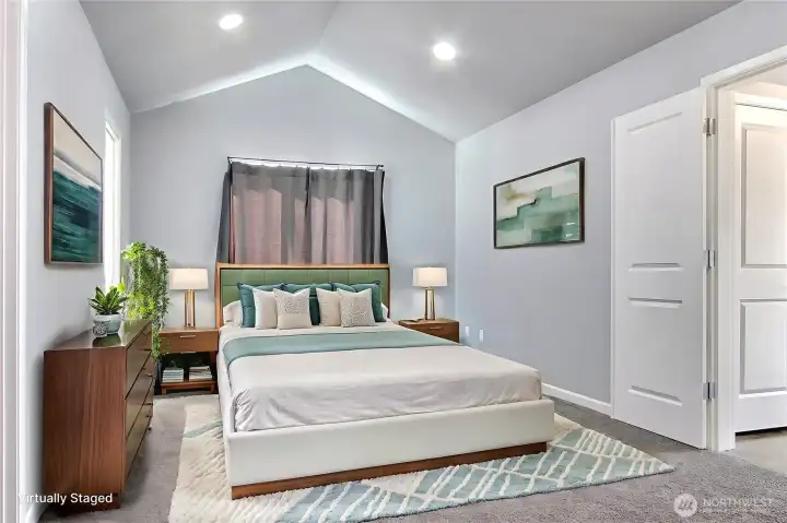 Master Bedroom with private living/office space through doors on the right
