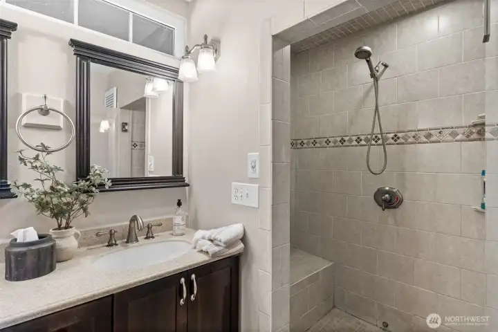 Ensuite primary bathroom. Plumbed and wired for steam shower.