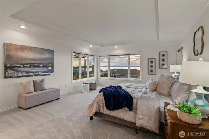 Main floor primary suite with private bath.