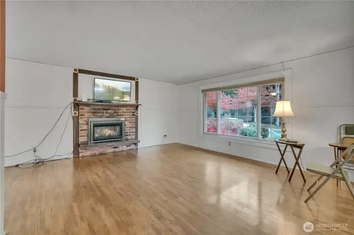 Hardwood floors and a cozy gas fireplace