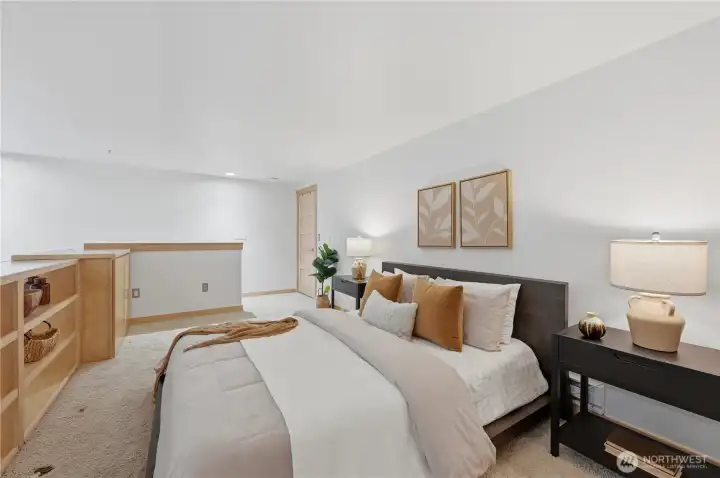 Here's looking from the far wall of the bedroom toward the stairwell & closet.