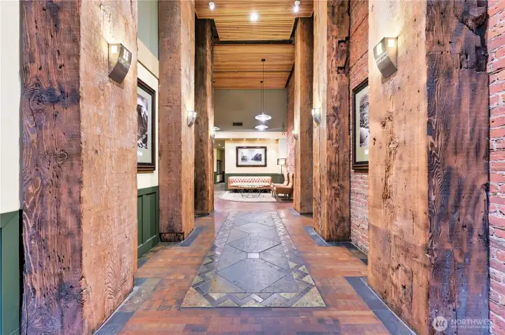 Check out this cool main lobby with brick walls & history of the Austin Bell Building with the original brick wall & some pieces saved.