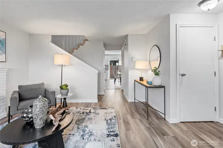 Home is completely refreshed with new interior paint, all newly painted doors and all new gleaming laminate hardwood flooring throughout the entire main floor.