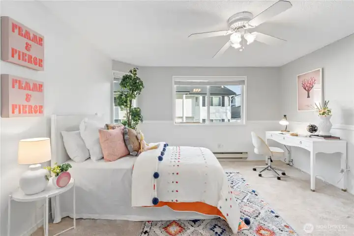 Wake up to morning sunlight in Bedroom #2 with its eastern exposure. Bedroom also updated with new plush carpets and new interior paint.