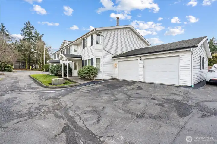 Townhome comes with a rare 1-car detached garage (far right garage) for secured parking and additional storage space. Unit also has a designated parking space next to the detached garage, one of very few townhomes in the community with this bonus reserved parking space!