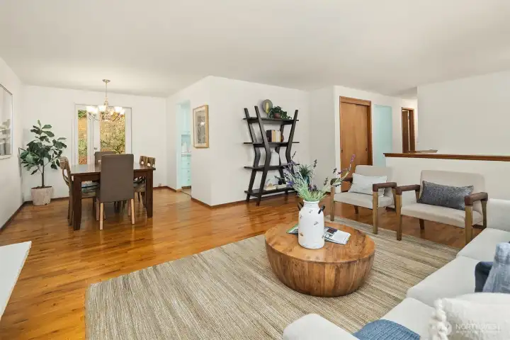 Comfortable living and dining spaces connect easily, creating a layout that feels open yet defined.