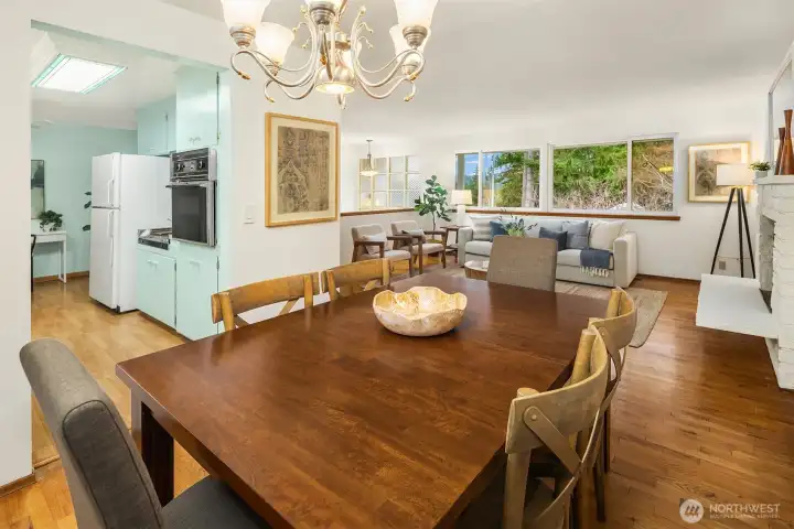 Dining space with direct connection to the kitchen, offering a functional layout with room for thoughtful updates.