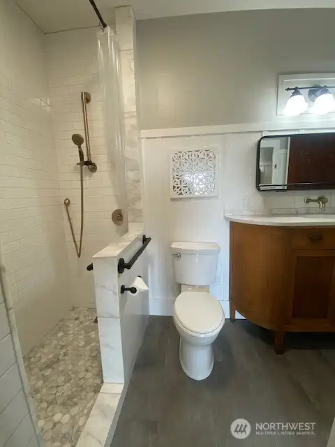 Updated bathroom located off of master bedroom on the main floor. Updated bathroom located off of master bedroom on the main floor.