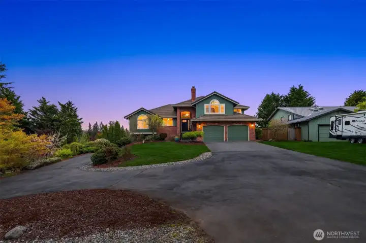 This almost 14K square foot lot provides ample privacy, parking, and room to roam in the fully-fenced backyard.