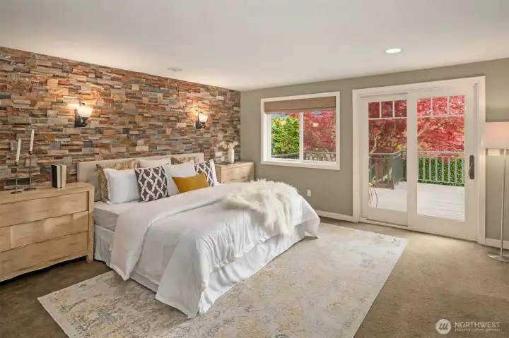 Primary Bedroom with en suite and private deck.