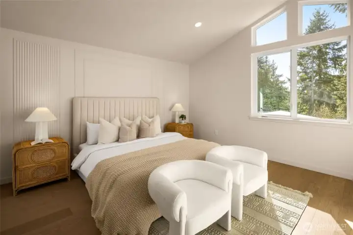 The large suite hoists the ceiling high, featuring a gabled roofline and celestial windows