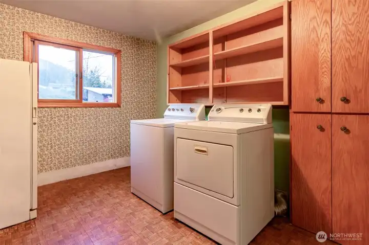 The large laundry room can also house all your pantry items. The large laundry room can also house all your pantry items.