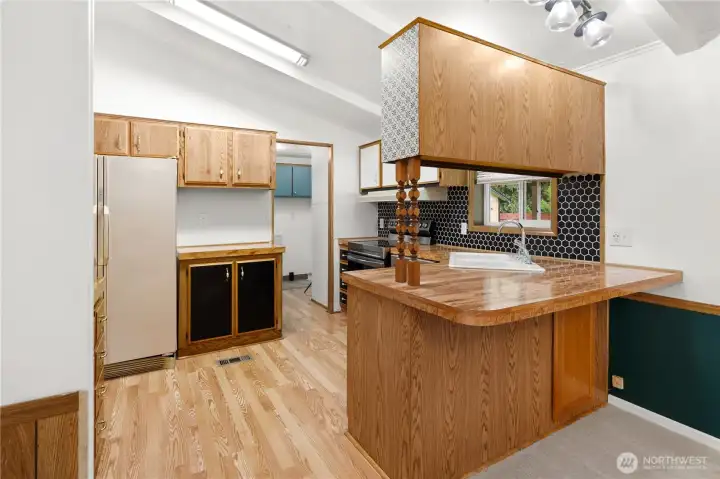 Kitchen with eating bar.