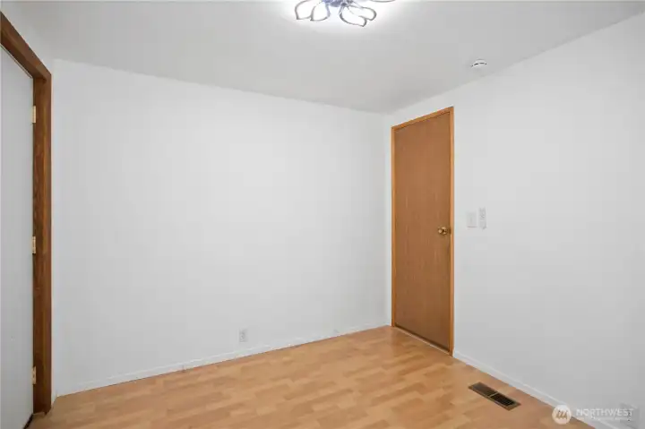 Another view of the office. Garage door to left of photo.