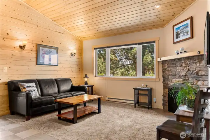 ADU living space, gorgeous textures throughout with wood and stone accents