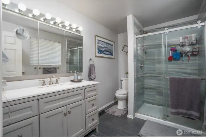The primary bedroom has a gorgeous bathroom ensuite.