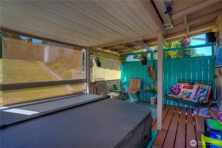 Private area off of primary bedroom. With a covered patio, one can enjoy the outdoors all year long.  Not pictured is a gas fireplace that stays with the house, so even on the chilliest of days, you can play on your patio.  Ahhh, life is good.