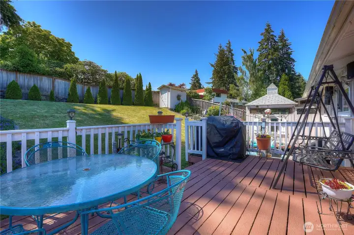 A large deck is perfect for dining outdoors and enjoying our beautiful blue skies.  This deck is separate from the private, covered patio.