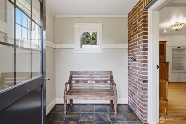 Welcome to the entry, a place to take off shoes and hang up coats as you enter this delightful home.