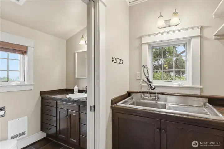 Half bath and utility sink.