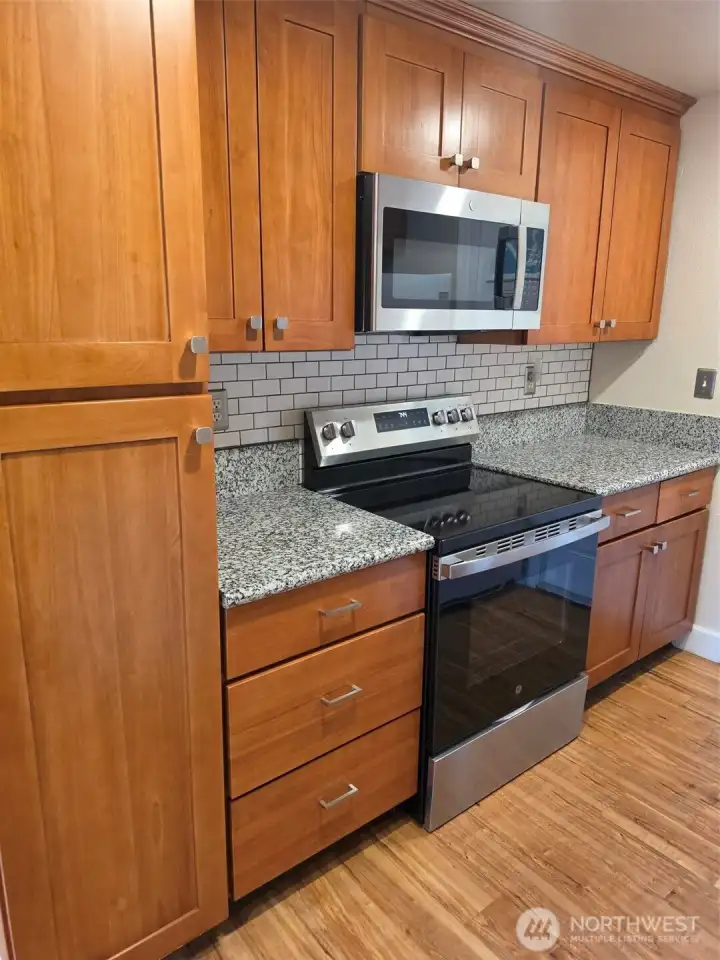 Another full picture of cabinets on north side of kitchen.