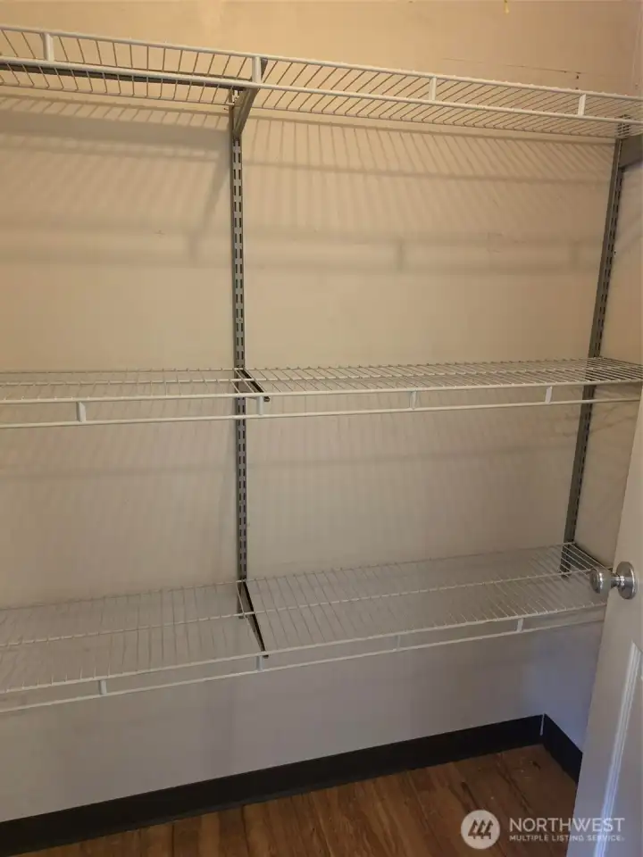 Storage shelves in H/W Heater closet.