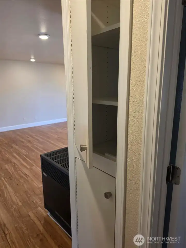 Additional hallway cabinets and gas heater.