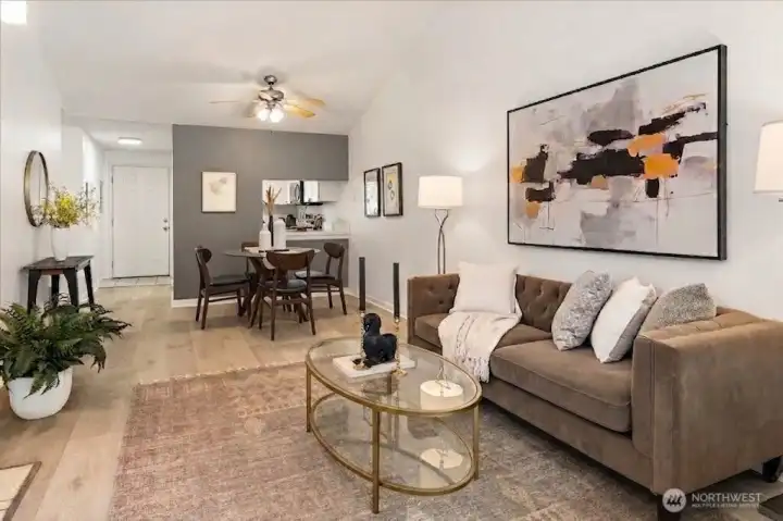 Soaring vaulted ceilings, a bright open layout, stylish finishes including Luxury Vinyl Plank flooring, and fresh paint.