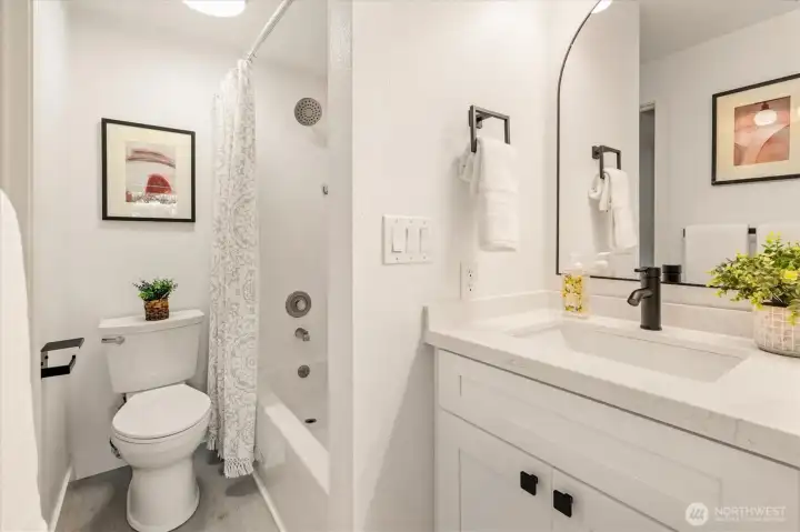 Fresh and updated 2nd bathroom with modern finishes and a bright, clean aesthetic.