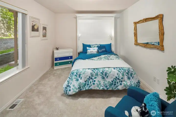 Main floor bedroom/flex use room 1.
