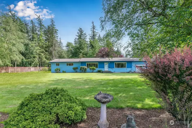 Tranquil home with tons of storage, RV parking, and lots of outdoor space to enjoy.  .
