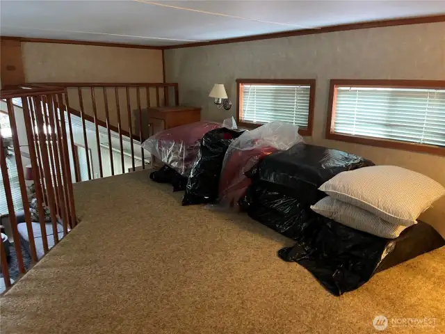 Plenty of room on other side of loft for more guests.