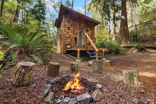 Enjoy time around a small fire - and then head into your Artist Shed...make this your getaway spot while you build your new home or...use it for your time away!