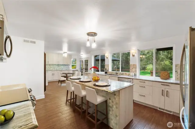 Pull up a stool and dine at the island while overlooking the backyard.