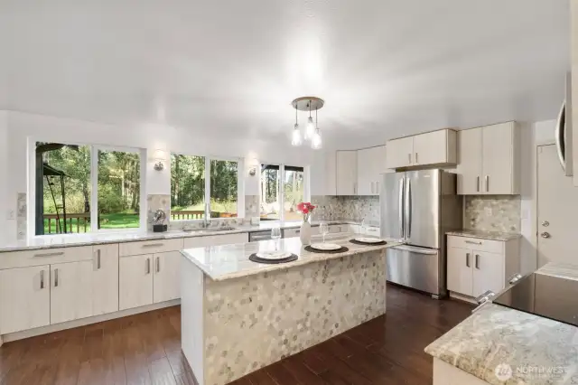 This view shows the scale of this amazing kitchen.