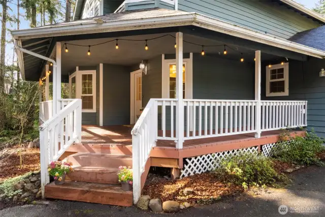 Covered country porch is a great place to sit and relax at the end of the day.